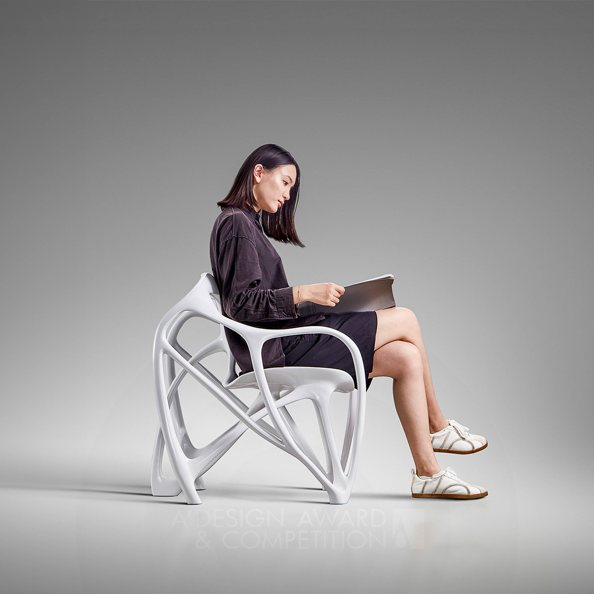yang siqi wins Silver at the prestigious A' Furniture Design Award with Spidique Chair.