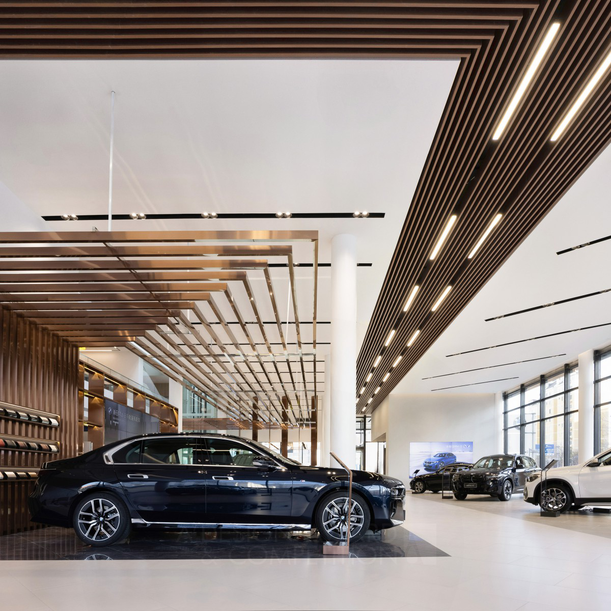 Yixian Chen wins Silver at the prestigious A' Interior Space, Retail and Exhibition Design Award with Rongbaohang BMW 5S Store.