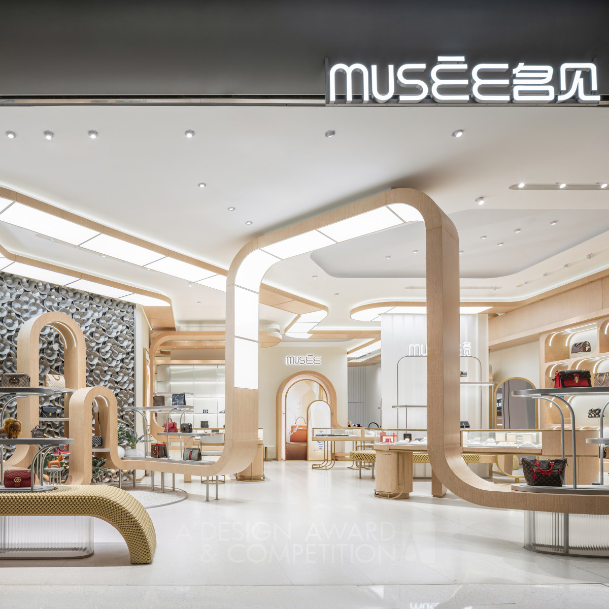 Mo Zheng wins Silver at the prestigious A' Interior Space, Retail and Exhibition Design Award with Musee Beijing Flagship Store Retail Design.