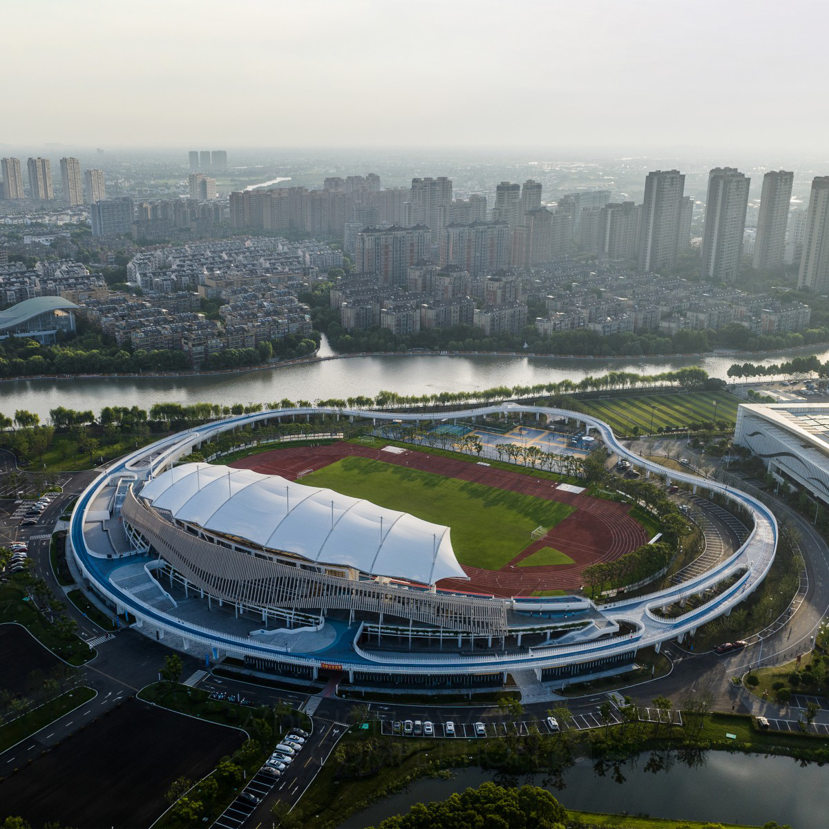 Zhejiang Pinghu Sports Center by Frederic Rolland, Jia Jiong and Wang Hanlu Golden Architecture, Building and Structure Design Award Winner 2024 