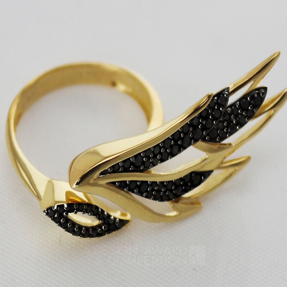 Garuda Collection ring, earrings by Amelia Rachim