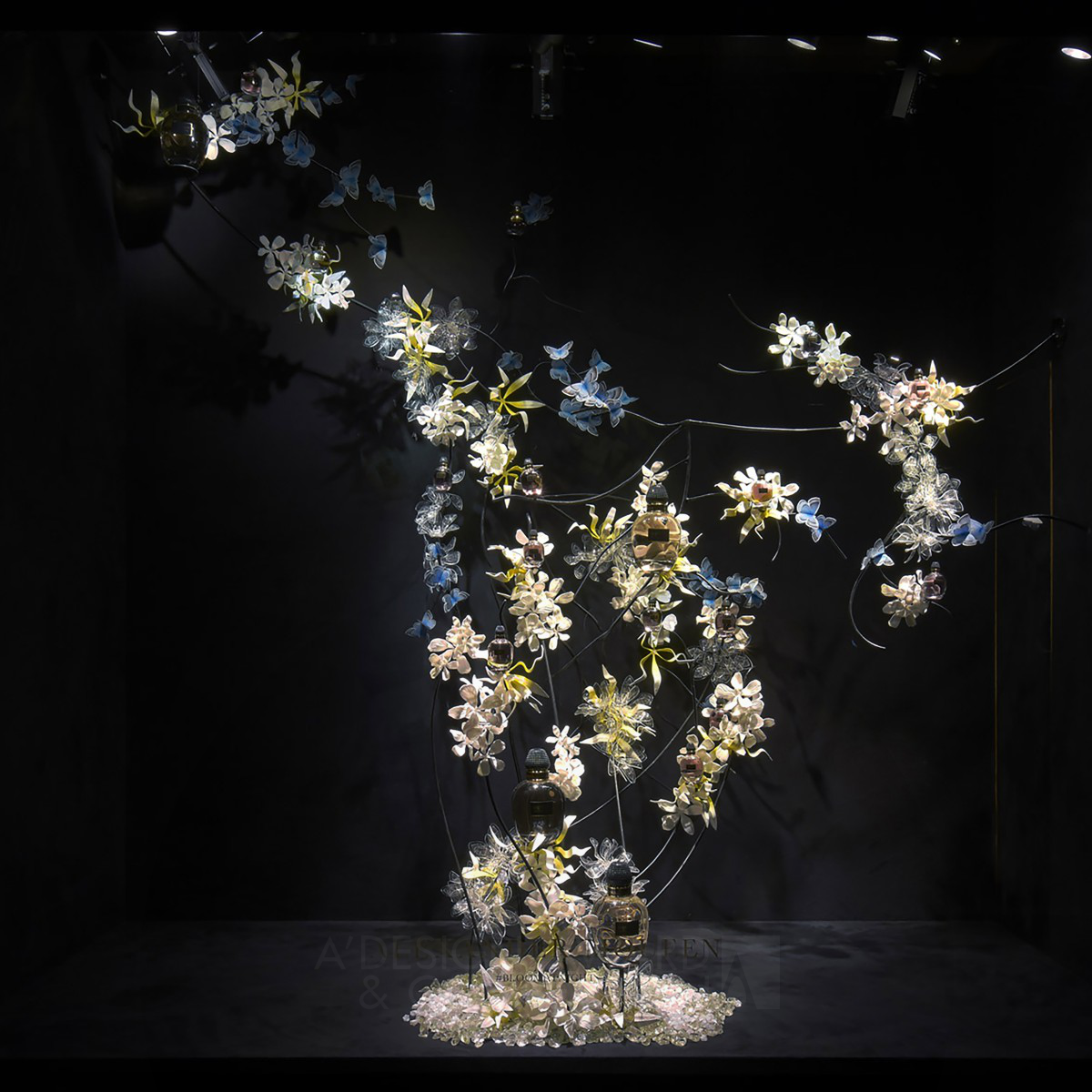 Bloom at night Visual Merchandising by L'Atelier Five