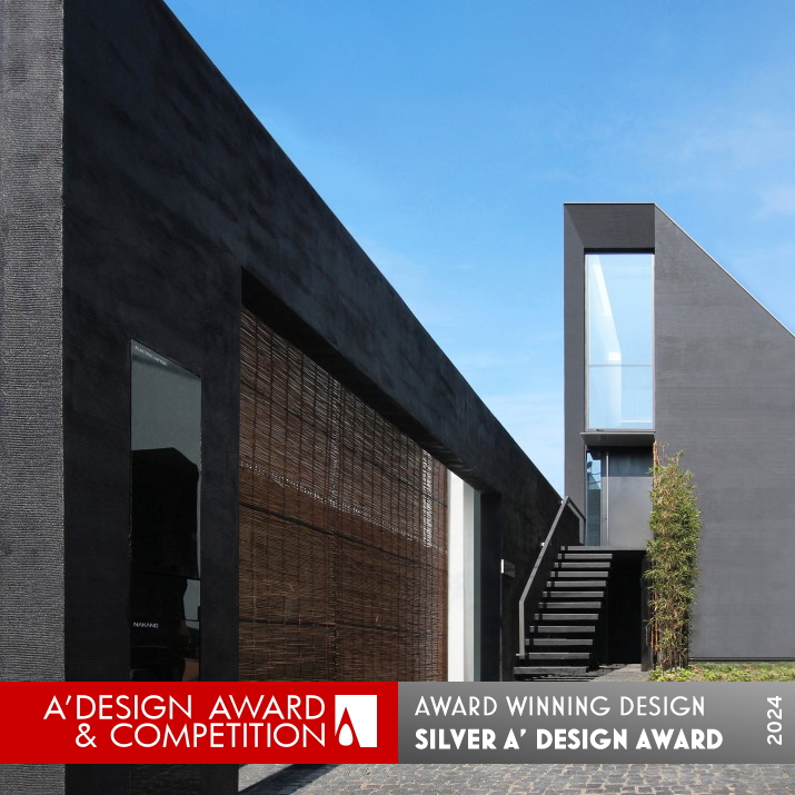 Black Monolithic Wall Residential House by Nobuaki Miyashita Silver Architecture, Building and Structure Design Award Winner 2024 