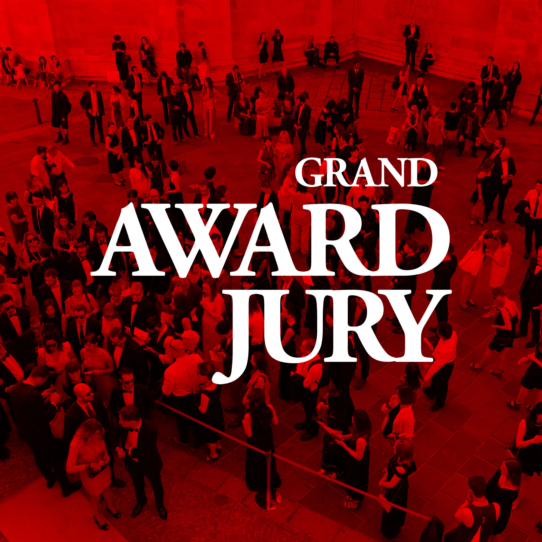 Logo della Grand Award Jury su una fotografia con sfondo rosso degli ospiti del gala