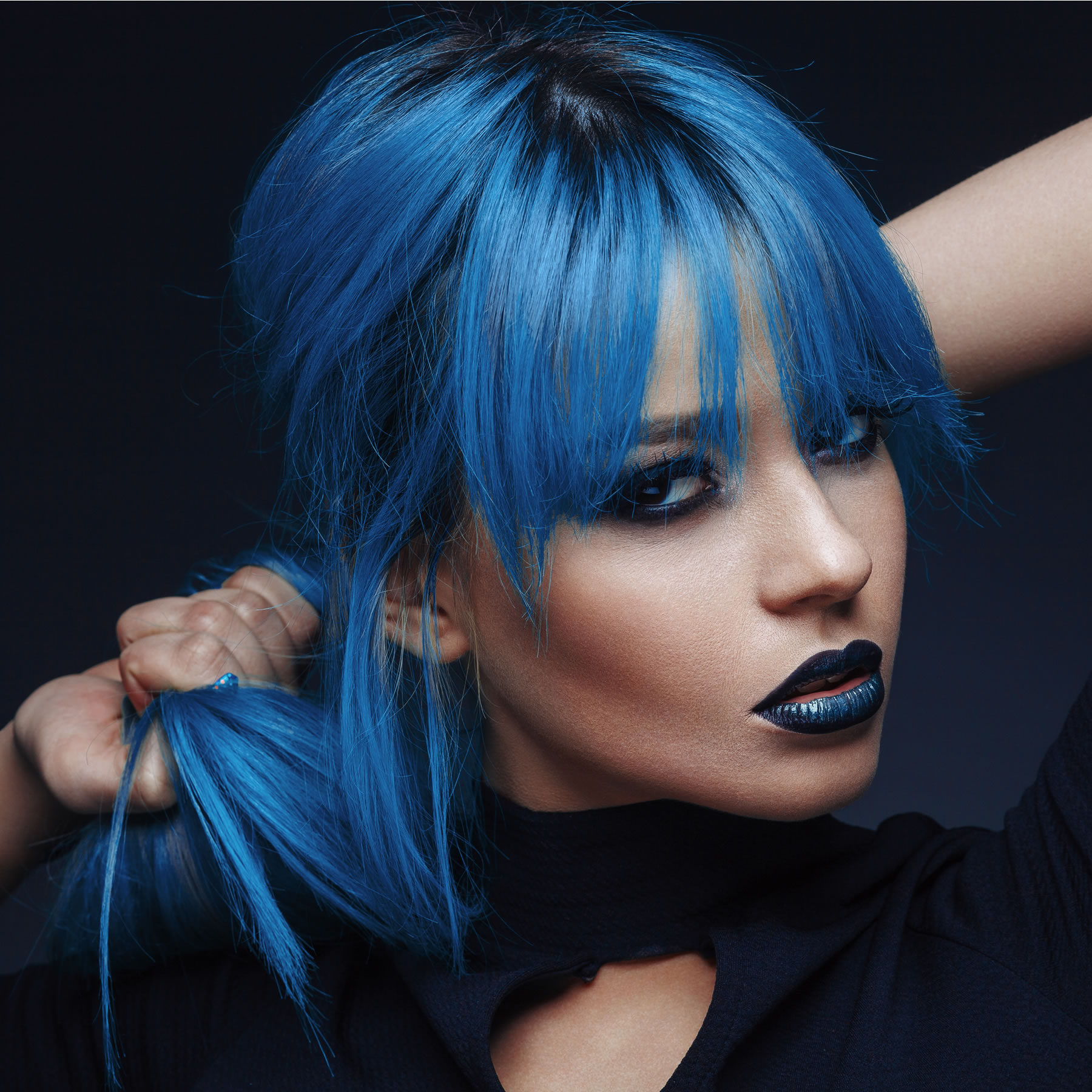 designer with blue hair