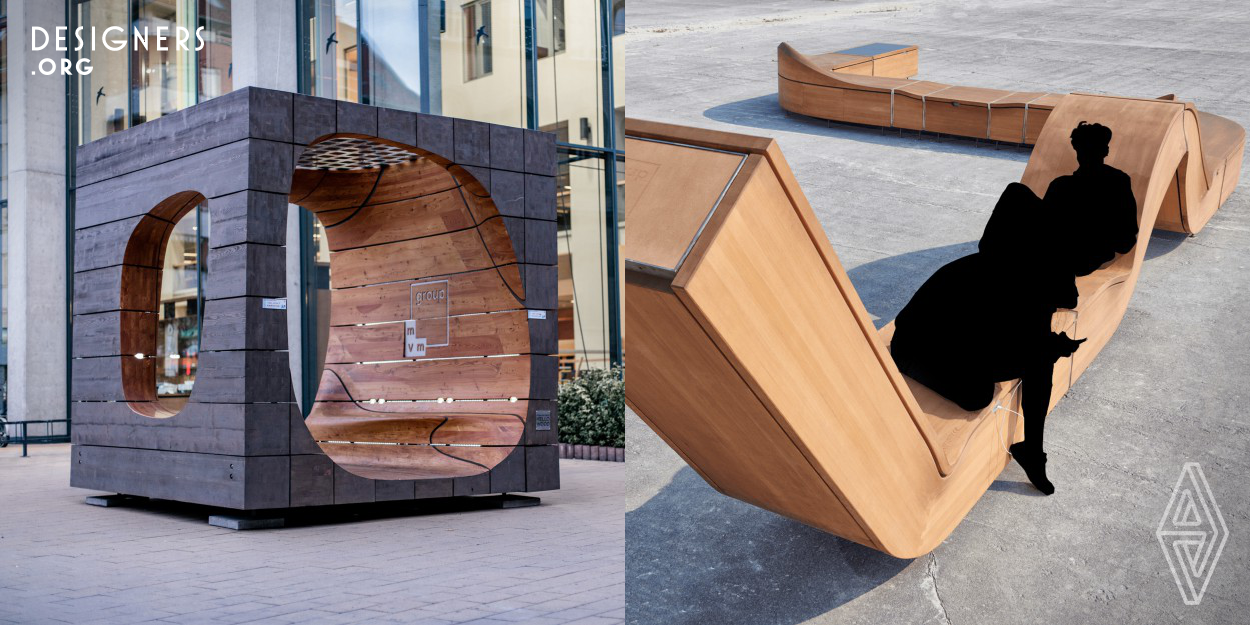 Hello Wood created a line of outdoor furniture with smart functions for community spaces. Reimagining the genre of public furniture, they designed visually engaging and functional installations, featuring a lighting system and USB outlets, which required the integration of solar panels and batteries. The Snake is a modular structure; its elements are variable to fit the given site. The Fluid Cube is a fixed unit with a glass top featuring solar cells. The studio believes that the purpose of design is to turn articles of everyday use into loveable objects.