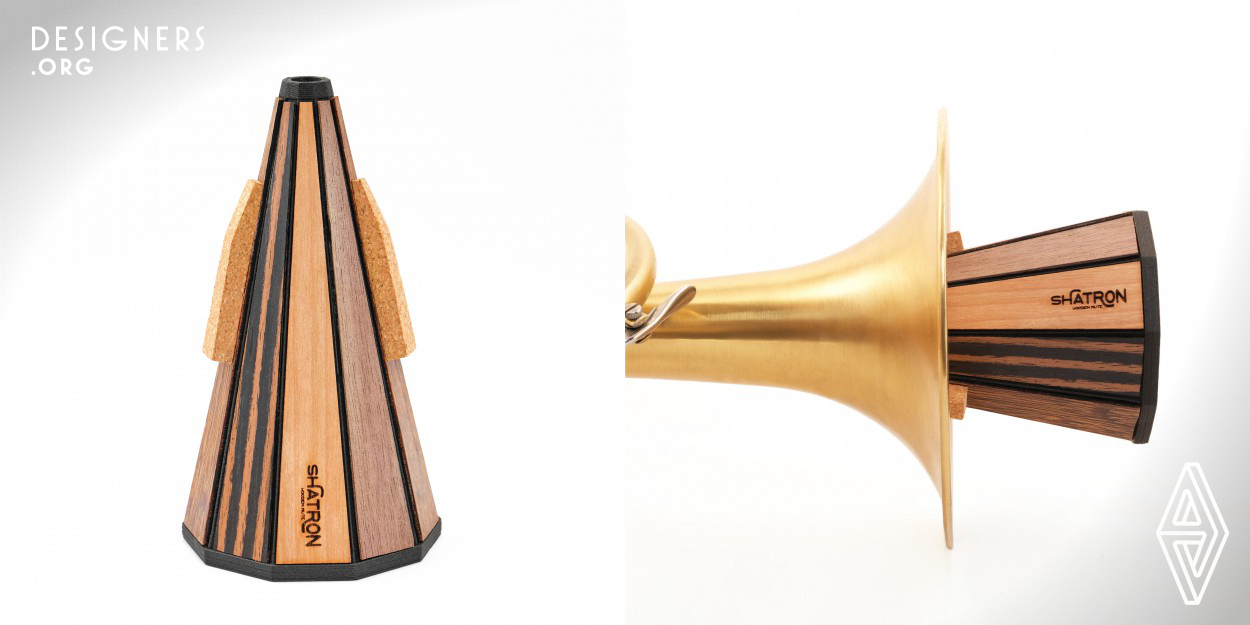 This object is one of more commonly device for a brass instrument. The design solution allows optimal performance conditions as it covers all the standard sound requirements. It consists of ten recycled wood scraps of different densities and types. The structure is produced in carbon fiber filament with 3D printing technology. The product took the meaning from the pyramidal Russian roofs of the 14th century used to amplify the acoustic of the architectonic space. Shatron addresses the trumpeter as a storyteller of new artefacts.