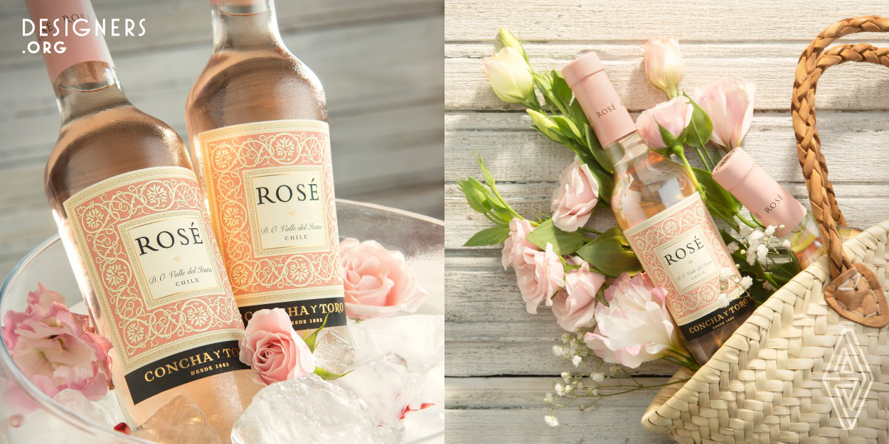 The design of the Rose label is feminine and elegant, the leaves of the vineyards are related to an exquisite pale damask color. Its color also interprets the fresh and delicate notes of grapefruit and melon, in addition to subtle floral aromas. Nature and its fruits, the leaves of the vines that get tangled up like the tendrils around the text are part of the aesthetic language of this packaging. The label is kindly assembled with a bottle with a feminine conicity and an elegant neck.