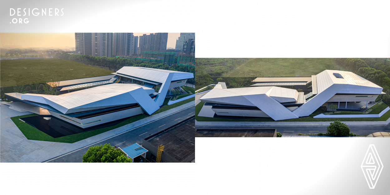The project is located at Jiangyin city on the edge of the Yangtze River. The Yangtze River is China's largest river, and it has nurtured the advanced Yangtze River Economic Belt. Designers use the advantages of geographical location to create an urban art experience center.This project is an integrated design that combines architecture, interior, landscape, and soft design.The whole design concept revolves around the flying over the water surface. Looking at the whole building, the design of the structure is like a pair of flying wings.