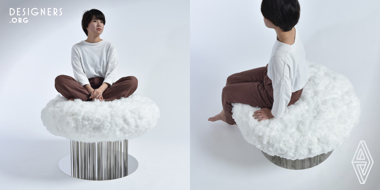 This is a cloud-like chair that is raining. The seating surface enables a cloud-like expression by piercing polyester fiber into the polyurethane foam with a needle. It was inspired by Needle Felting. A high seat gives the seated person a floating. Stainless steel round bars are 5mm in diameter. There are 100 thin stainless steel bars. In addition, the mirror-like stainless steel legs and pedestal made it possible to express the rain.