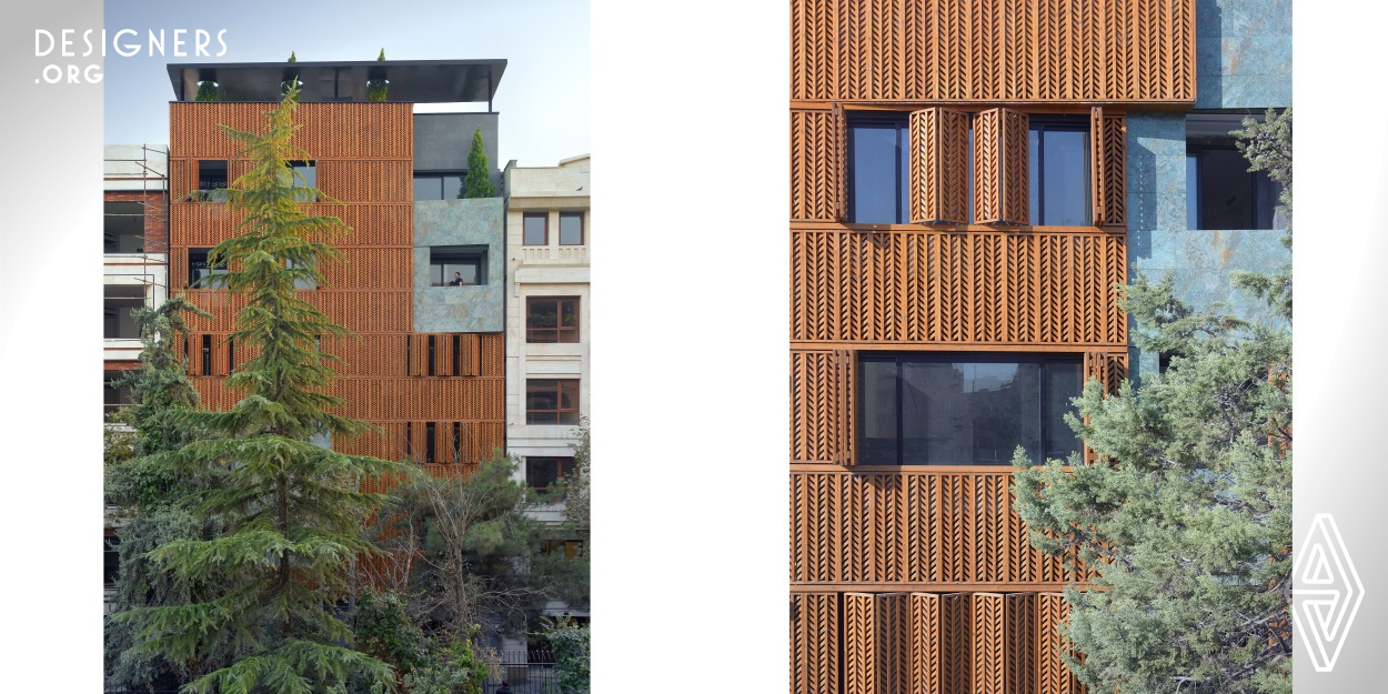 The 9 stories building, inspired of Persian historical vertical gardens. The facade is a combination of a simple surface that completely encloses a volume by making diagonal section cut. Surface is a wooden lattice by pattern deign inspired by the metaphorically the cedar, the dynamic lattice is so flexible that can be opened or closed by users to adjust privacy. While the other surface is totally covered by turquoise stone, is a small garden in the lobby and back yard which is like a sunken courtyard and there is a roof garden with trees.