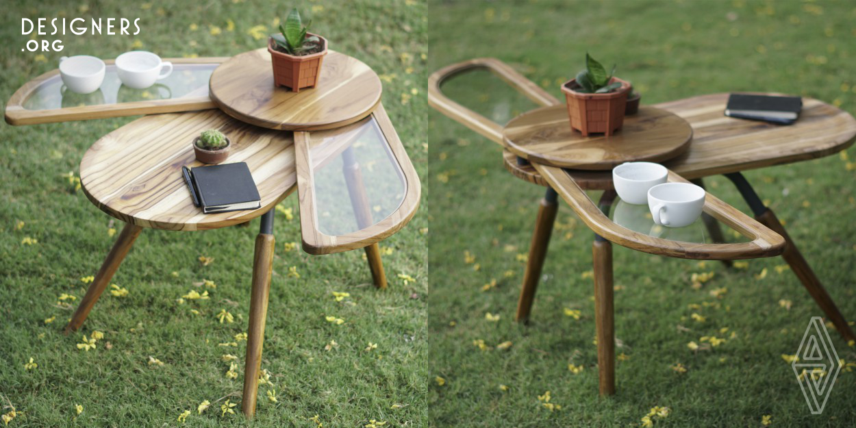 Elytra is designed in a way that allows the user easy access to increase the table top surface because of its non-static nature. The biomimetic, dynamic table's surfaces are split into four broad parts, including a wooden "head" and "body" as well as two glass-inlay wings that can be opened out simultaneously to expand the table's surface to store an extra few cups of tea, a planter or two, and perhaps a notebook to doodle your ideas on.