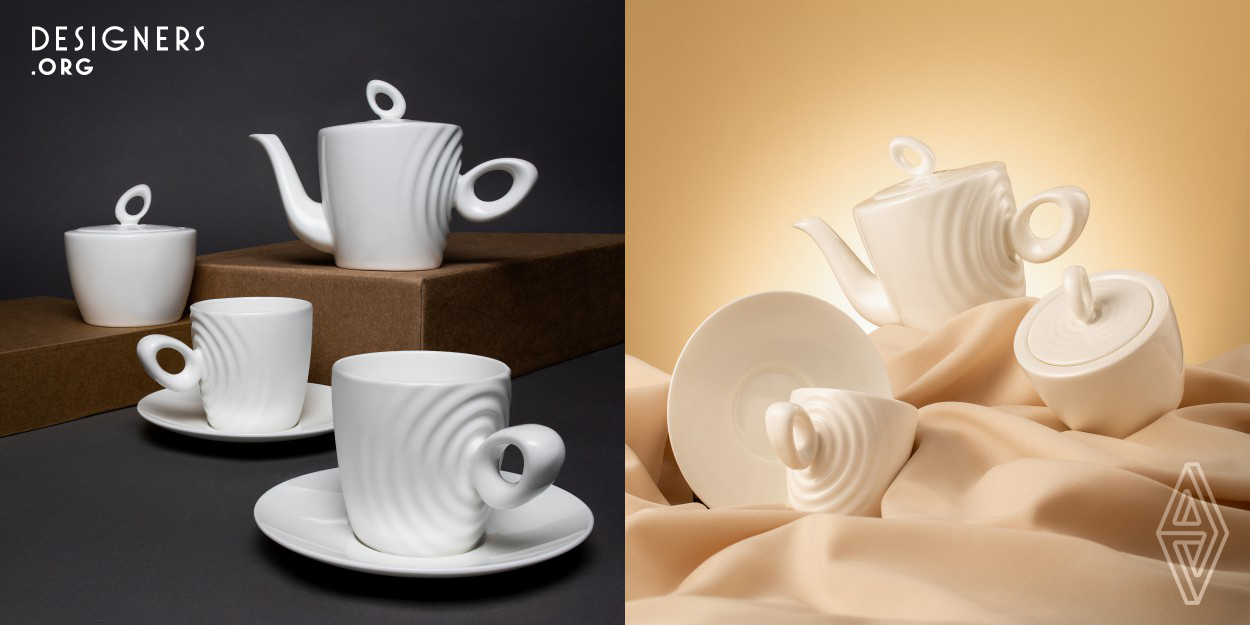 Attimo (meaning "moment") tea set is made of first-class thin-walled bone china. The metaphor of the shape of objects is a stopped moment of time. The handle-stone falls on the smooth surface of the porcelain, and creates "circles on the water" running along the object. So every touch for the handle is a touch for frozen time. This complex asymmetric shape of the service items is especially difficult when implemented in porcelain. However, the use of the hollow handle technique, proactive correction of firing deformations, made it possible to achieve an ideal geometry.