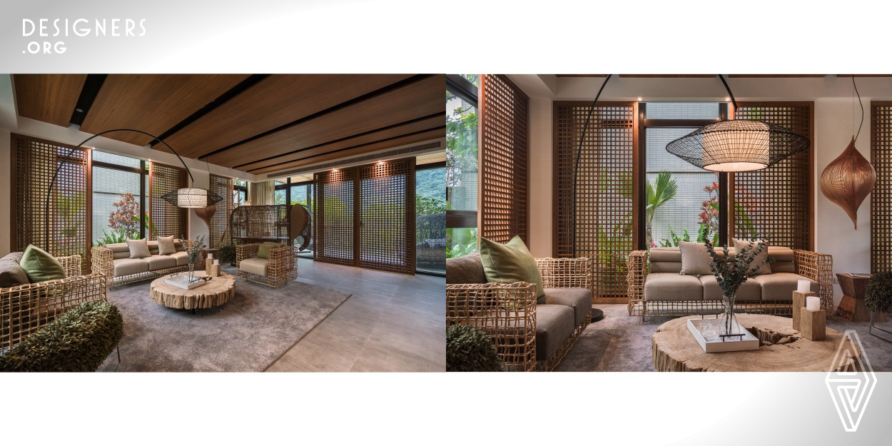 This holiday villa residence on the hillside, shows the taste of modern life and the pursuit and desire for nature. Designers have simplified the burden of the compartments and used a large number of hollow rattan furniture and grille elements to introduce sunlight and open up a smooth and free movement, which also echoes the outdoor tropical flowers and plants and the green scenery. The interior uses natural wood and gray matter as the color basis of the space, which is more worthy of a timeless taste, leading the residents to explore the holiday lifestyle of New Asia.