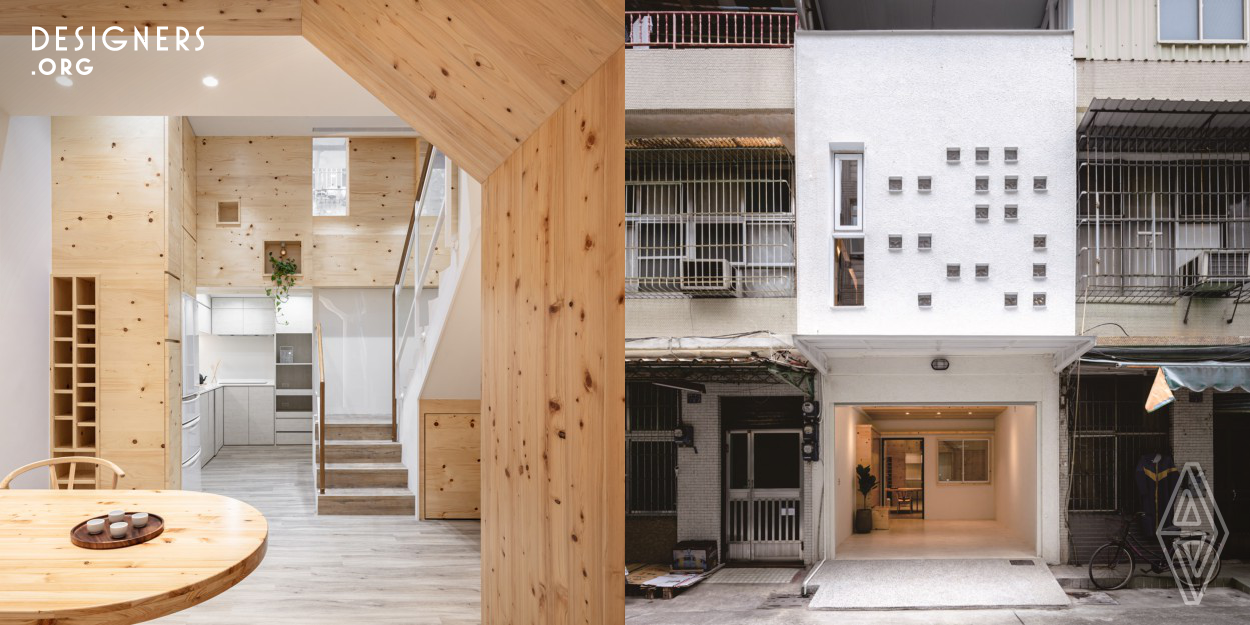 "This residential house, which sits in a 6 meters narrow alley, glows with the natural light. Maximizing quality of space and convenience, we re-introduce the couple to a new chapter of life". The building is renovated from a 40 years old house, introducing the space with an understanding of owner’s daily routine, a collection of exploratory ideas, and settlements through concepts of flow and decoration. There are three main perspectives on revamping of this residential building prioritize daylights, select natural substances and create a smooth traffic flow. 