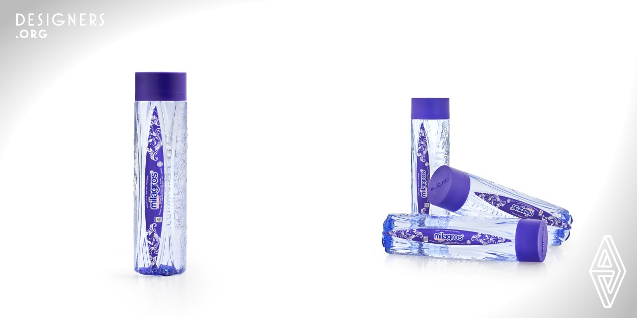 Milagros is an alkaline drinking water bottle with a visual and shape that results from a combination of art, technology and precision. The purple color that is identical to the pH of alkaline water combined with the detailed batik variations on the label and on the left and right sides. And the shape that curves inward embossed by the brand, designed to make it easier to hold.