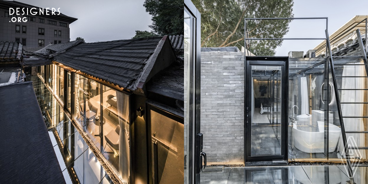 This small courtyard is located in a hutong in Beijing, where the client lived with her grandparents when she was a child. However, the house has been dilapidated due to years of wandering. The purpose of this renovation is to create a living space suitable for the modern lifestyle for the client. Mirror glass is used on the ground and walls of the yard. The unique reflectivity of the material allows the surrounding hutongs, trees, and sky to be reflected on the ground of the yard, which brings more possibilities to space.