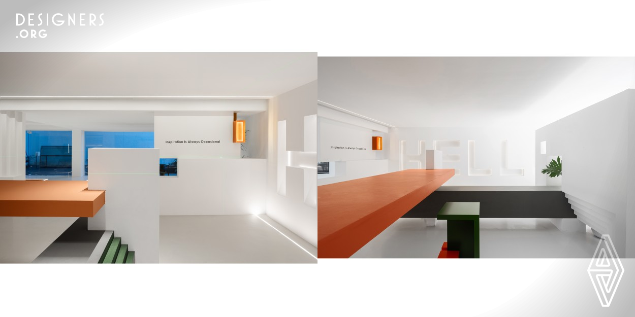 The overall space is mainly white , and what enters the space is a very structured shape, which not only enhances the sense of space, but also partially obstructs the view. The doorway shape is connected with the bar counter, which has a sense of high and low patchwork, and is also distinguished by different color blocks. The different colors of latex paint contrast with the overall white color, highlighting the uniqueness of this area. The free space with simple materials and appropriate proportions expresses the designer's design concept with simplicity and simplicity as the core.