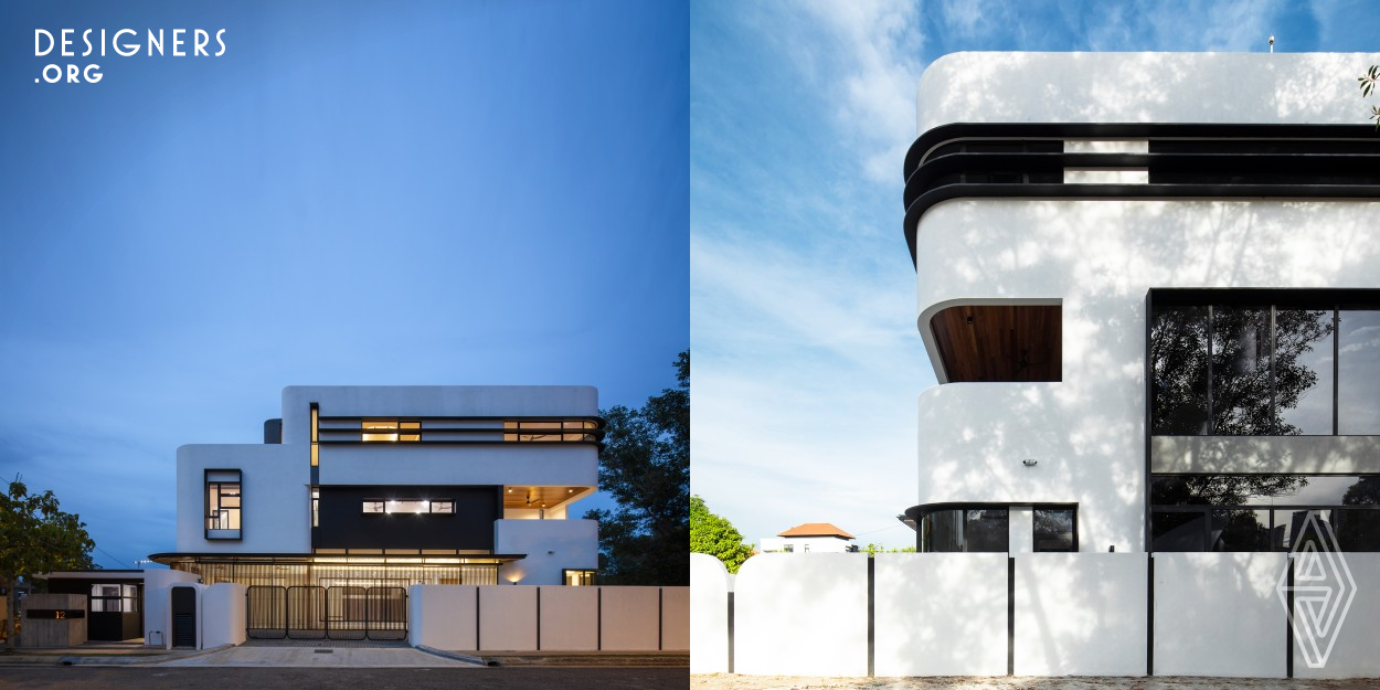 The idea was to maximise the corner lot building plinth using rounded corners or rounded edges, the filleted streamlined form in response to the tropics, designated programmes and its neighbourhood.  Viewing the building from the street level, a staggered filleted mass was elevated vigorously from its surrounding. The palettes of materials combined the white, black, and grey curved solid planes with touches of timber and transparency of glasses, streamlining a form which is manly standing out within its neighbourhood.