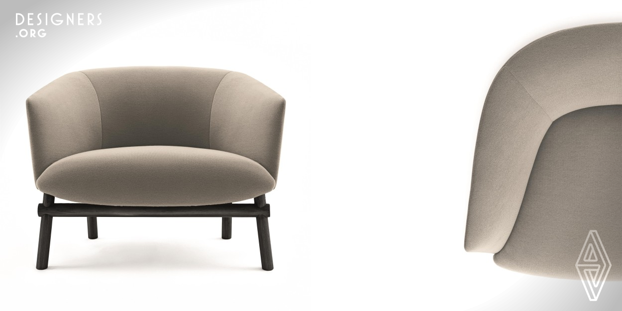 Livre was born from the idea to blend together the desire for the concept of an Asian-inspired product with the actual perspective of GallottieRadice. The result of this is an armchair that could be define hybrid for the craftmanship applied to the solid wood base; the upper part is instead an enveloping armchair, that feels like a cocoon, very elegant in its shape in contrast with the base which is thick but at the same time tapered, interesting and very soft as a whole.