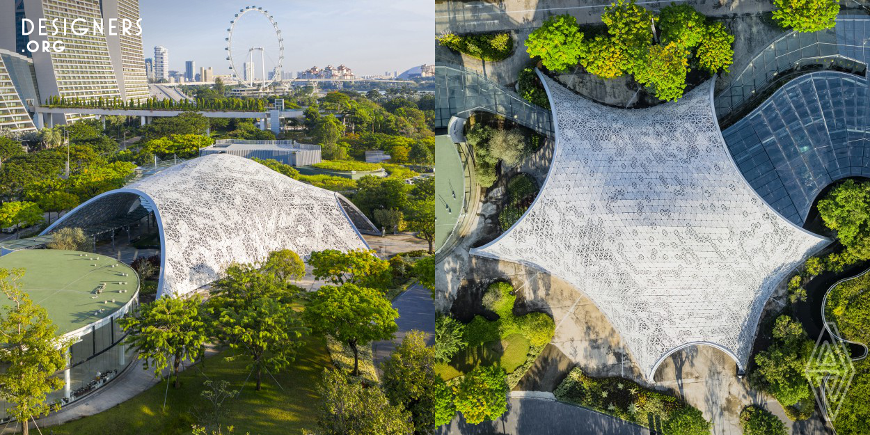 Located in Singapore’s Gardens by the Bay, the Bayfront Pavilion follows the tradition of architectural structures that evoke a dialogue with nature by blending a complex computationally generated and optimised form with a perforated skin fluidly with the adjacent environments. For visitors, it offers a climatically comfortable outdoor environment and a visual experience akin to walking under the foliage of lush tropical trees. Since its completion, the project has become a popular building and new entrance to the Gardens that serves as a venue for important community and cultural events.