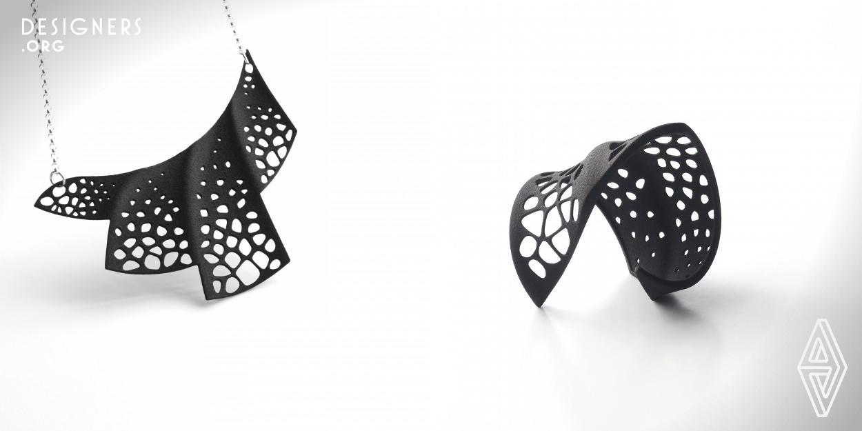 Biroi is a 3D printed jewelry series that is inspired by the legendary phoenix of the sky, who throws itself into the flames and reborn from its own ashes. Dynamic lines forming the structure and the Voronoi pattern spread on the surface symbolize the phoenix that revives from the burning flames and flies into the sky. Pattern changes size to flow over the surface giving a sense of dynamism to the structure. The design, which shows off a sculpture-like presence by itself, gives the wearer the courage to take a step forward by drawing out their uniqueness.