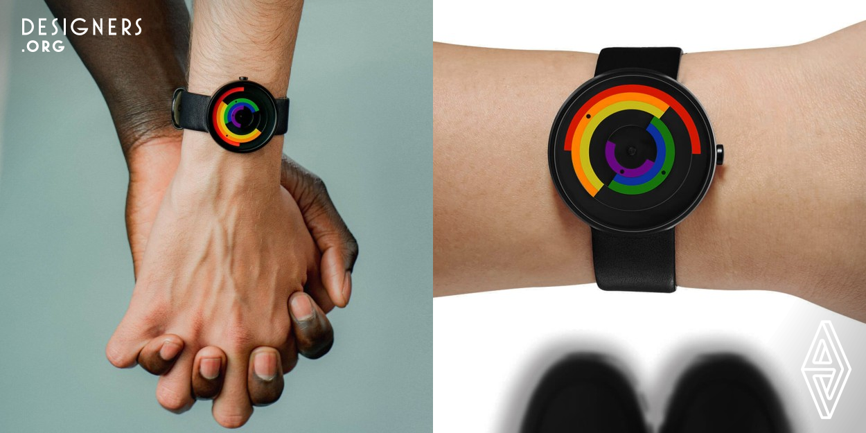 Inspired by pride parades which take place annually around the world. The pride watch is a timepiece dedicated to those individuals who have bravely stood with pride for the rights of all people. The hands of the watch feature the six colors of the rainbow, which continually move about the face and create kinetic patterns. Twice a day, at both noon and midnight, the colors come together to create the shape of a rainbow. Beauty comes in all colors and is heightened by those colors’ alignment. 