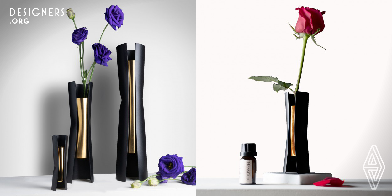 The beautiful curvy shape of Courbe vase, is made of two tubular metal pipes by innovative technique that bend and clamp two pieces of metal pipe, which is a pipe within another pipe at the same time without any welding process, producing a unique flower vase and also serve as a diffuser bottle. The two tone color coating of the pipes, black and gold, enhancing a sense of luxury.