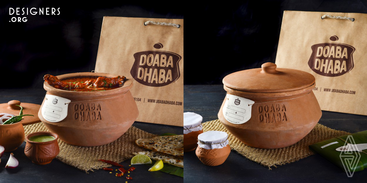 Doaba Dhaba is a cloud kitchen concept in India that gives the customer the bandwidth of selecting their own choice of food, in their own choice of cooking, and their own choice of gravy. The Brand Identity and packaging of Doaba Dhaba are designed keeping in mind their values of authenticity and sustainability. The identity reflects the rustic and organic feel of the brand. The main dishes are packed in Handis (clay pots), handcrafted by local artisans. The rotis and naans (flatbreads) are packed in banana leaves held together by jute threads. These go into a bag made of recycled paper.