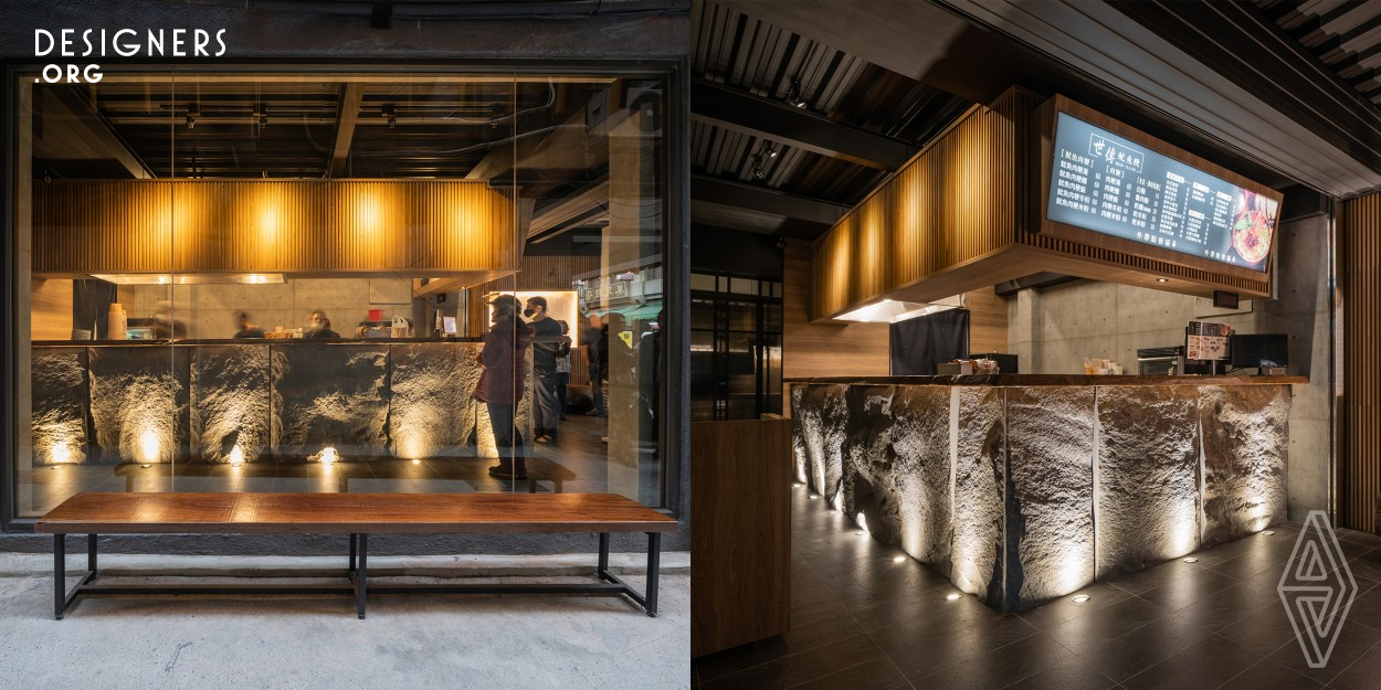 Walking on the street, the restaurant stands out from the rest of the shops with its new cloth in wooden bars interweaved contrasting with the steady stones. The two main materials used here for exterior design represent the long history of its food, service, and memory. Both materials take time to form. The heaviness of the stone stands for the importance, whereas the wood stands for the flexibility and hospitality, interweaving into a great long history holding up the restaurant. Finally, the lighting delicately brightens up the space and sets the tone as comfy yet simple.