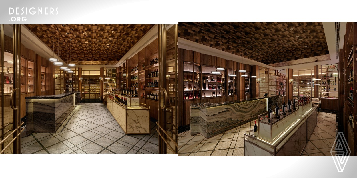 Through spatial planning, it completely sorted out the functions and the harmonic traffic flows. On the first floor, a curved display cabinet and marble bar counter is placed, offering multiple liquor products; the end of the hallway has a storage area for the wine collection. The storage area is surrounded by glasses that reserve fine wine and the shift of time, just like Pandora's box; it retains the surprising unknown and imagination and provides the collector and buyers with a facility that possesses both beauty and function.