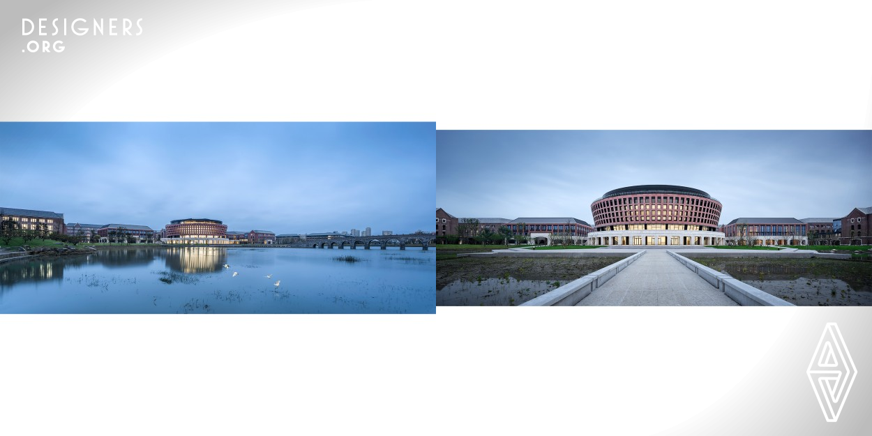 The International Campus of Zhejiang University (Zjuic) locates beside Juanhu Lake, China, occupying a land of 800,000 square meters with a gross floor area of 400,000 square meters. The campus's overall planning and design is based on 1 axis, 2 circles, 3 centers, and 4 zones. It absorbs the forms of relevant spaces and facades worldwide. The design enhances the guidance, fluidity, openness and publicity of the building complex by bridging the site’s north-south corridors and setting clear open spaces and routes.