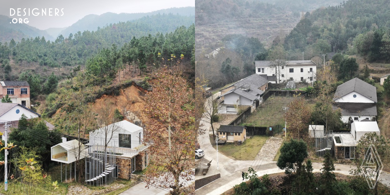 A ruined stone house located at the entry point of the village was chosen as the site of the community activity center. The design challenge is to accommodate the preservation of the original structure as much as possible and installation of new functions. Two existing trees are kept on the site, a steel-tube-supported stairs were constructed around the trees, which leads to a new platform that also serves as the entrance to the second floor. Built during the pandemic, the project was completed mainly by the locals through a community participatory process with low-tech methods.