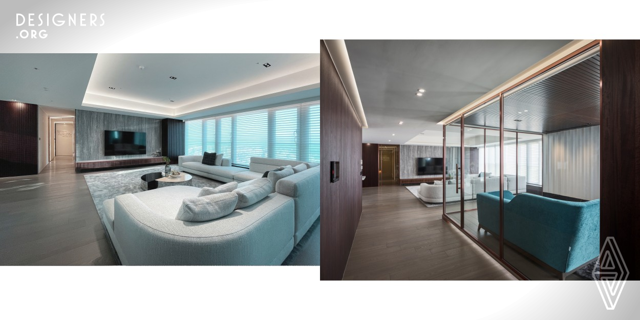 A luxurious penthouse apartment overlooking the city in New Taipei City, Taiwan. As it is usually in the fog like living in the clouds, inspired by it's nature state, this design is based on thoughtful selection of rich and elegant cool-toned colors and shades to create a noble and stable atmosphere. The dark-toned space as the main theme, and the ingenious mix and match of different textures further stimulates the harmony of Zen. Living in this peaceful home is like meditating in the mountain that brings people stillness and relaxation in the midst of obstacles in life.