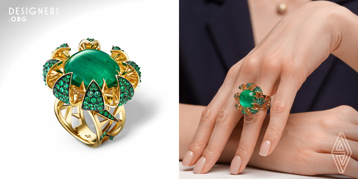 The Cactus Ring, from the Japanese Garden collection, is made of 18K gold with unique 12 ct. Cat's Eye effect Ural emerald, small emeralds and diamonds. The needles are located in the inner side of cactus petals and form a plane for the central emerald cast. The central emerald represents the cactus flower, and small emeralds are set up-culet.
