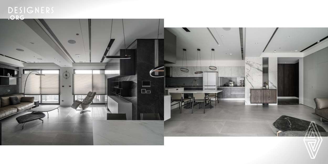 The use of low chroma scheme creates a pure and unadulterated perception of the environment. The contrast between black and white is balanced by the timely use of gray scale, which weakens the color boundary and adds layers to the space. Escape the hustle and bustle of the city and enjoy natural light that flows into the room through floor-to-ceiling windows. Neat and clean lines reduce clutter visually. The natural texture of the stone is ravishing and injects a gentle and elegant base, creating a calm and peaceful spatial sequence with a combination of rigidity and flexibility.