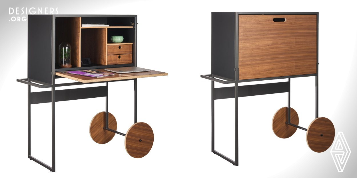 The design idea of The Free Spirit model is to easily move the work element from one room to another. Because of this function, the element is equipped with wheels and a handle to allow easy mobility. When the worktop is closed, all materials and tools become invisible and the desk turns into a closed cabinet. In addition to the worktop, the closed part of the element consists of 2 lockable drawers, a drawer for A3 and A4 papers and laptop, space for folders, power sockets and a USB charging station. The aesthetics of this compact product are quite easily adaptable to different interiors.