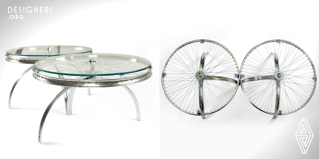 Rims and Spokes, as the name speaks for itself, a Coffee cum showcase table made from rims and spokes of a bicycle topped off with chamfered glass pane makes for an excellent focal piece. The design is innovative yet simple, elegant yet functional. It fits all types of interior settings due to its chrome-transparent color scheme. The height of the table is deliberately etched to suit a relaxed floor seating setup. Overall the ingenuity and creativity of the product is unique and may just be the perfect center piece for any space  of just about any customer.