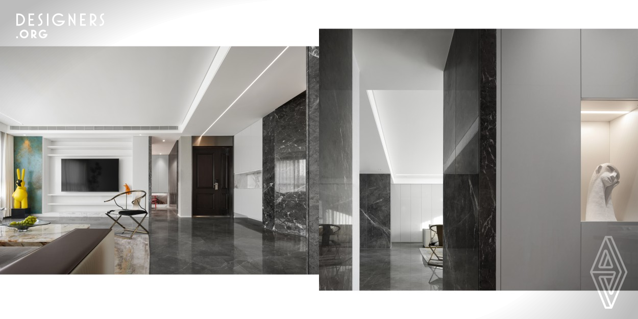 The project provides a decoration scheme for a family of three. It adopts an innovative space design, which integrates the public areas and removes the doors to create a living space with a sense of transparency and efficient circulation. The main tone of black and white not only looks clear, but also highlights other colored embellishments, therefore enriching the overall visual effect and avoiding monotony. Although the perception of space and colors varies according to different people, the black and white background often provides a strong sense of space.