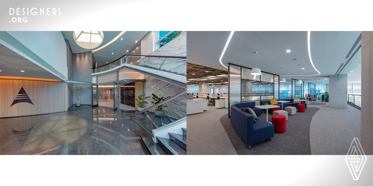 The design features the corporate culture of state of the art technology and its innovative application, which is embodied in the overall layout of the headquarters, renovated from an old structure. The indoor space is characterized by grayish white hues to create a bright, neat and lively vibe. The open floor plan, combined with large amount of glass as a transparent medium, constructs an office section open, bright and conducive to friendly interaction.