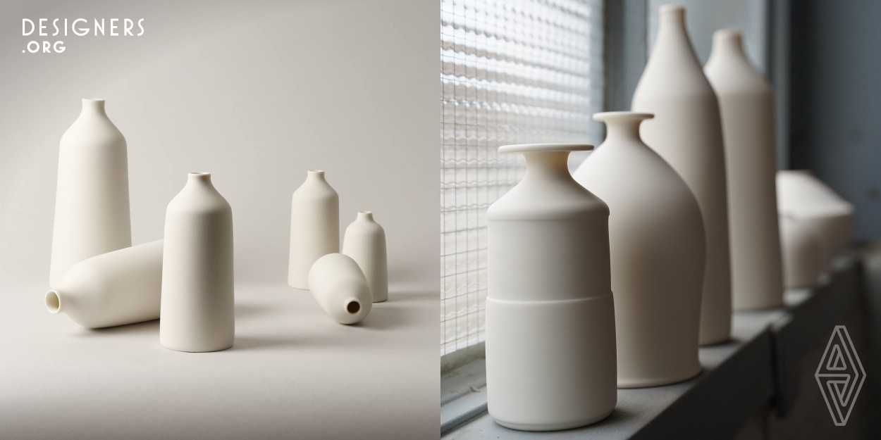 It is about how the object is affected by light and shadow. More specifically, how the shape is affected by it. That's why the Plain Vase was created with a minimum of lines, carving out a balance between light and shade. The vases are arranged like columns that create a monochrome silence when flowers are let out. This gives the freedom to arrange the flowers as desired. By touching the soft baby skin surface, one notices the evenness that surrounds the vase entirely regardless of shape or size, this is the commonality of each piece.