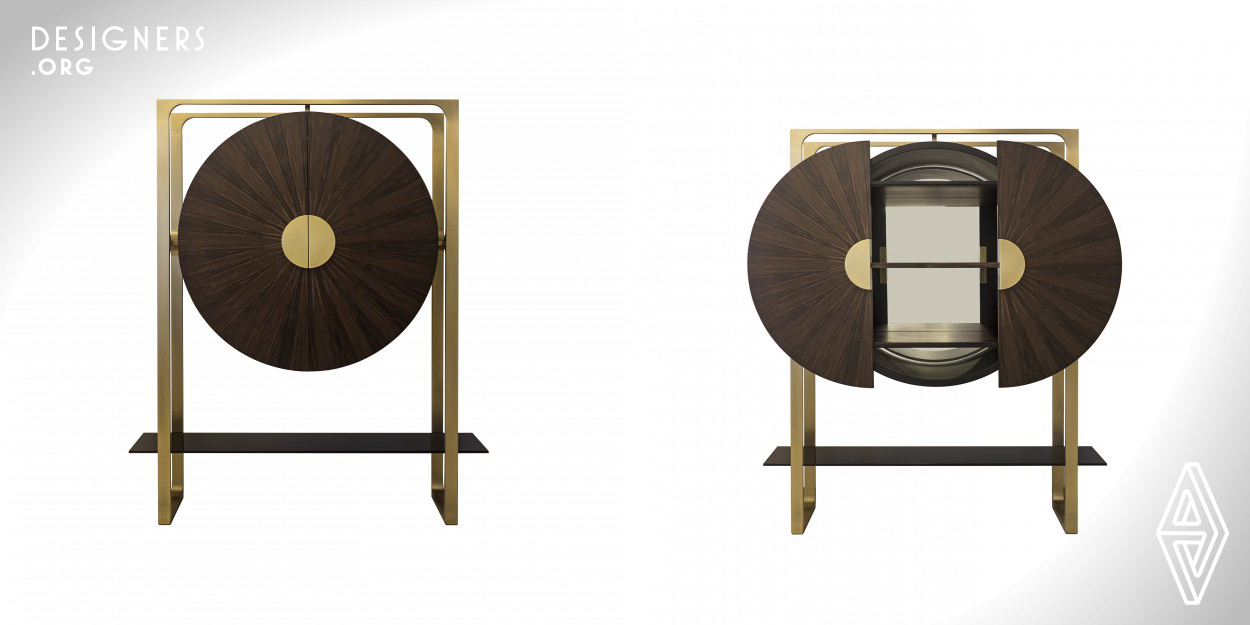 The Gong bar cabinet has two sliding doors made of handmade palisander wood marquetry revealing three wooden shelves, dimmable lighting fixed behind mirrored back panel. The round cabinet box is painted black inside and outside. One tempered black glass shelf at the bottom of the cabinet, serves as a structural element enhancing the stability of the cabinet and creates additional storage space. The structure of the cabinet is made of fully loaded brass profiles. The cabinet offers spacious storage space for the battles and glasses. The light turns on automatically when the doors open. 