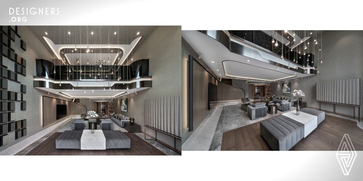 The designer was tasked with remodeling a generous four storey villa in Kowloon, Hong Kong. This capacious 700 sqm residence with elevator is the new home for a young couple. One of the space standout features is the soaring ceiling in the living space. The designer is therefore making use of this most eye catching part to create a luxurious yacht inspired interior with a hospitable and friendly personality that would definitely impress visitors when entering the abode. As such, comfy and stylish design elements, as well as relaxing hues have been thoughtfully applied to the overall decor.