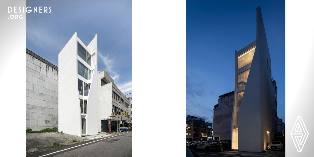 The building's exterior appearance is simplified, demonstrating a sculpture-like artwork towering over the base. The face of the main building is outlined through two curved lines. Besides, the solid construction is covered little by little and unfolded by the softly curved surface, just like a calla blooming quietly from the street block. Over-the-top furnishings have been abandoned to create abundant storage space. Additionally, the bathroom on the top floor is located at an external window, affording an exquisite view of Hualien.