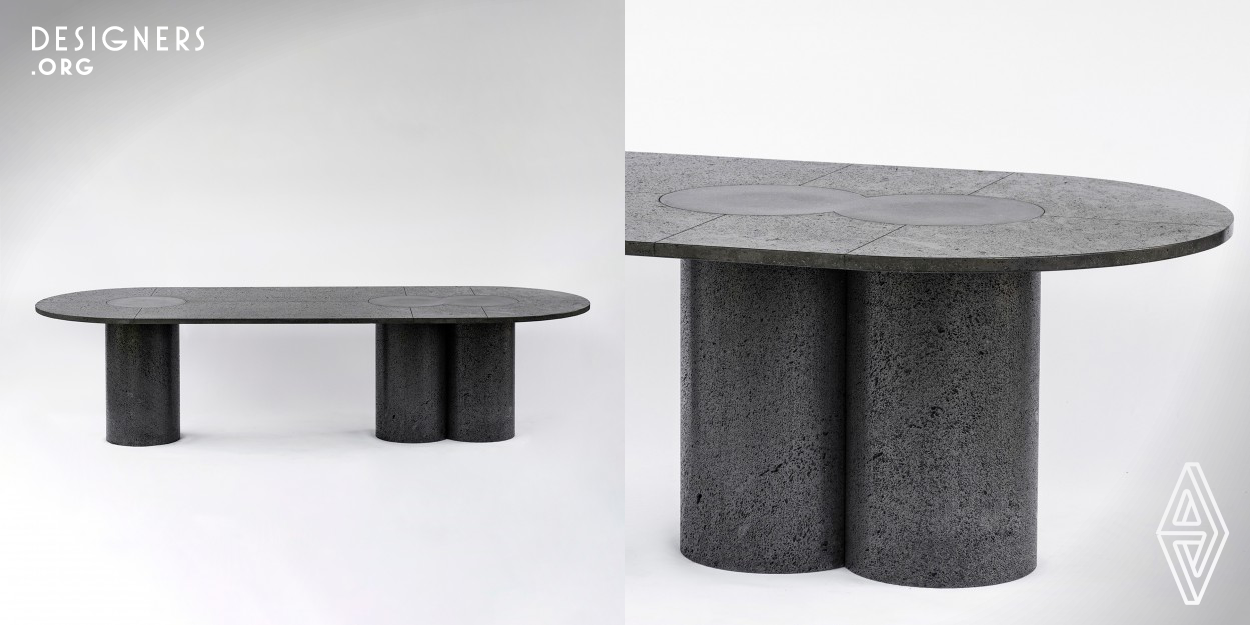 Petra is a massive volcanic stone dining table for indoor/outdoor use: a homage to the Mexican terrain that portrays its whims and character through its materials and impeccable craftsmanship. Through its surface, etched lines run connecting each of the three circles of polished stone strategically mirroring the monoliths underneath.