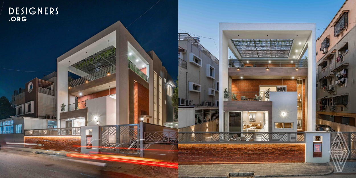 A multitude of massive frames at various levels, spacious semi-covered green terraces at all floor levels getting animated with play of light as it permeates through the geometrically patterned MS trellis at the top of the largest frame and a unique experience of varying volumes right from the entry. All this sum's up very briefly the spatial experience of The Shaded House. Continuing the stark of minimalistic style of modern architecture, the Shaded House incorporates the Indian-Modern aesthetics replete with modern amenities. 