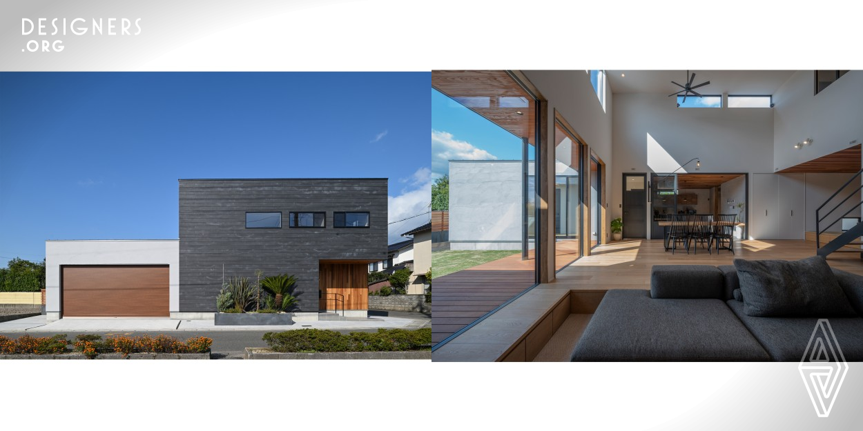 The client's request was to create a house where family members can feel each other's existence wherever they are in the house. U Shaped was designed in Yonago city, Tottori prefecture, Japan in 2020. All the parts facing the road are made into walls to shut the line of sight from the outside, and the living room is bright with a large glass wall and open ceiling. It is a house where families can feel each other's existence wherever in the house they are. 