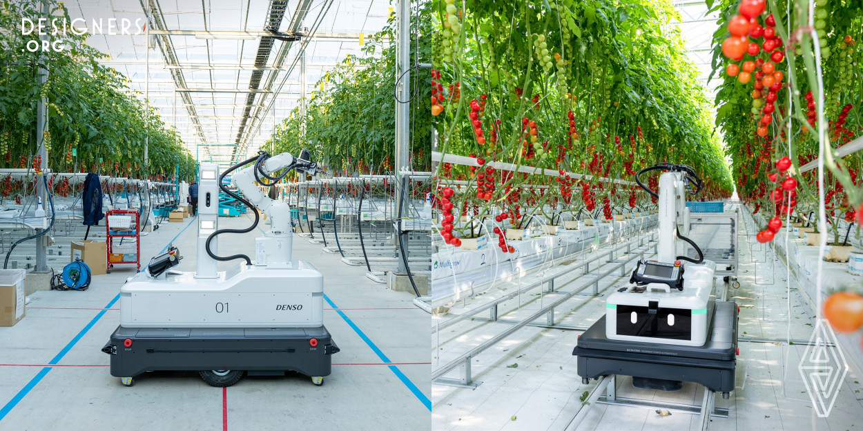 With the decrease in the global agricultural population, labor saving is needed for harvest work. To meet this need, the design team gave its automatic harvesting robot aimed for a display that workers would easily accept as the face of a robot they could work alongside. The robot's eyes meet people's eyes from any angle, which imparts a sense of security. The soft, fully-tapered surface reduces the feeling of intimidation and the kind feel of the pearl-like finish generates affinity with the arm robot. For hygiene, the top surface is free of places where dirt can accumulate.