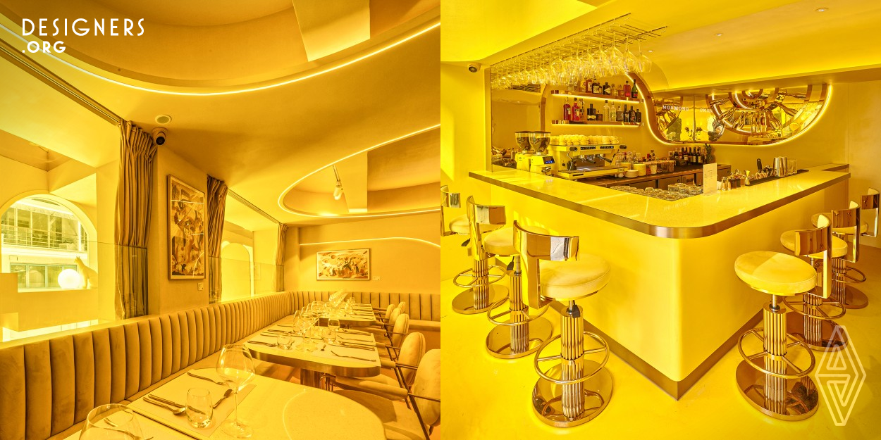 This yellow architecture is a restaurant, gallery, and art piece. With the brand core of montage, monochrome and monogram, the project aims to position itself as an urban art insertion expressing its obsession with monochrome. The space is fully finished in Yellow and Gold, giving people a sense of surreal feeling of being in the world of art. With its iconic glowing arches on the facade, simple and elegant curvature design, stair art installation, and the use of mirrors in a playful way create an artistic and interesting abstract atrium, a monochrome art sculpture in the city. 