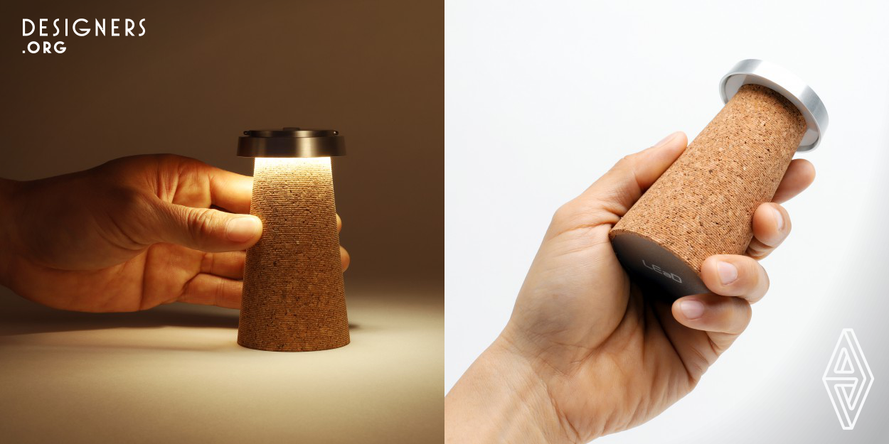 Recycled corks from wine bottles consumed in Tokyo are collected and re-molded into the body. The light emitted on the cork's soft surface emits a warm glow on the spot. Compact size that can be carried even in times of a disaster. The gentle light leads you to a hope in any place. Rechargeable for up to 13 hours of lighting. This lighting was designed to contribute to a sustainable society by recycling corkscrews, which are usually thrown away, as a valuable resource. As of now, some of the corks collected from about 750 restaurants in Tokyo are being used.